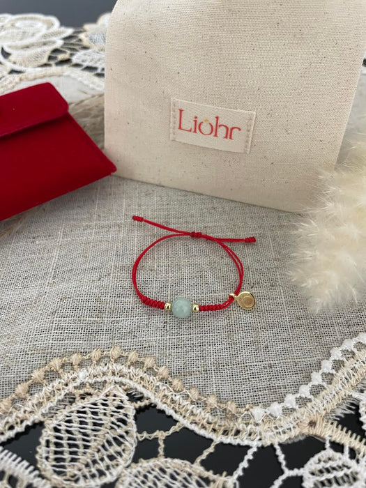 LIOHR BABY BRACELET MEANINGFUL TRADITION. HANDMADE WITH RED THREAD . SKY BLUE CRYSTAL BRACELET LIOHR