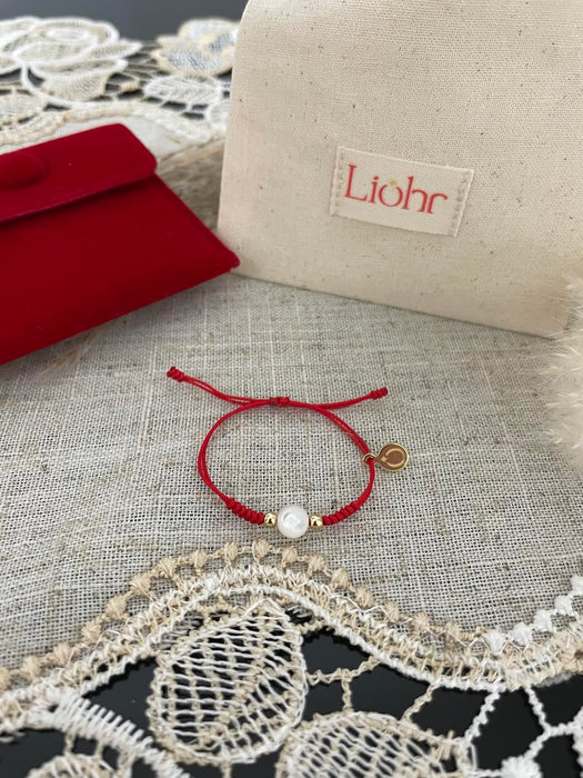 LIOHR BABY BRACELET MEANINGFUL TRADITION. HANDMADE WITH RED THREAD . MOTHER OF PEARL BRACELET LIOHR
