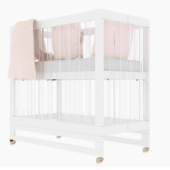 White portable clearance crib