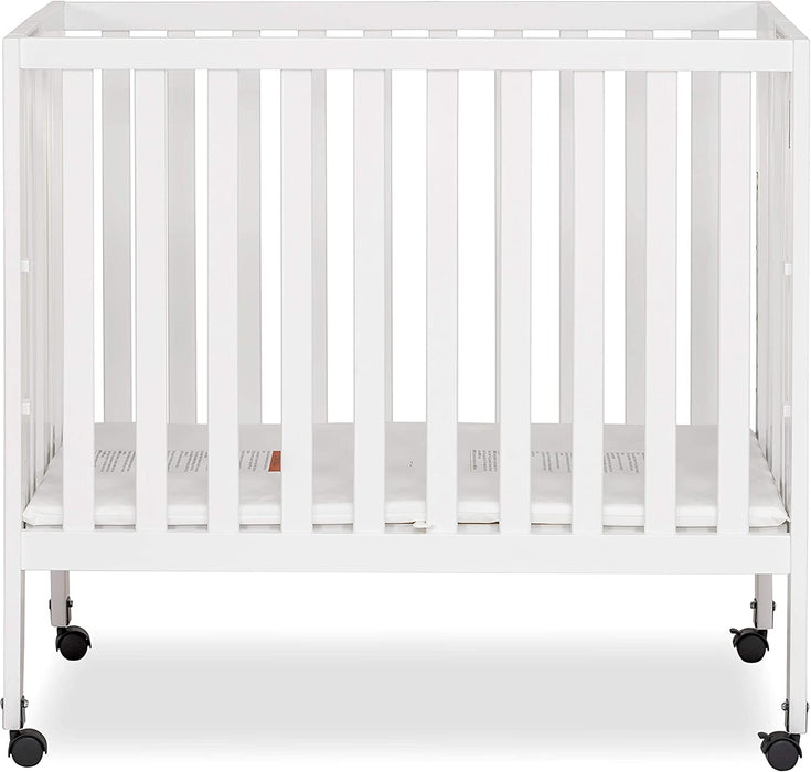 Dream on me folding mini crib best sale