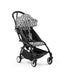 STOKKE® YOYO³ STROLLER FROM 6 MONTH . ZEBRA ON BLACK STROLLER STOKKE