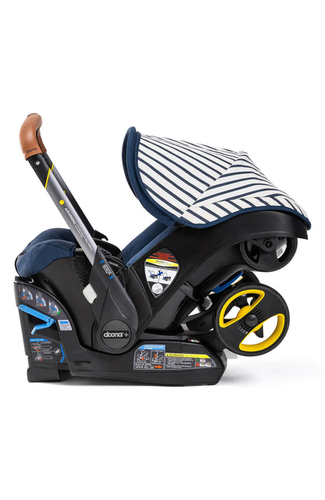 DOONA INFANT CAR SEAT & STROLLER, VACATION (LIMITED EDITION) STROLLERS DOONA