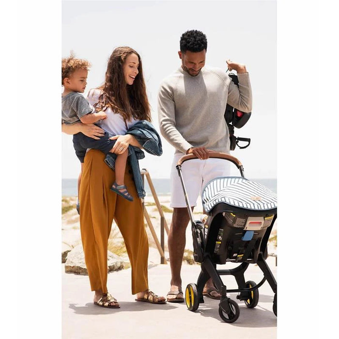 DOONA INFANT CAR SEAT & STROLLER, VACATION (LIMITED EDITION) STROLLERS DOONA