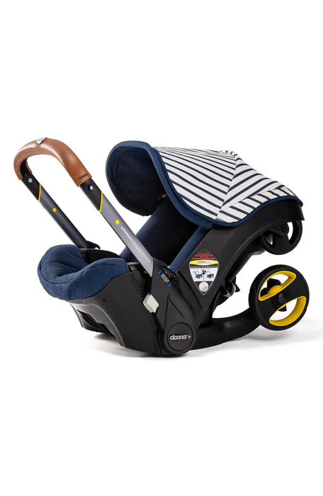 DOONA INFANT CAR SEAT & STROLLER, VACATION (LIMITED EDITION) STROLLERS DOONA
