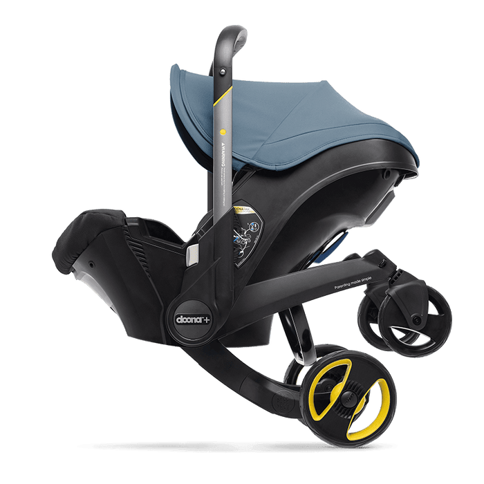 cheap baby car seat and stroller DOONA INFANT CAR SEAT & LATCH BASE STROLLER — Little Luxury